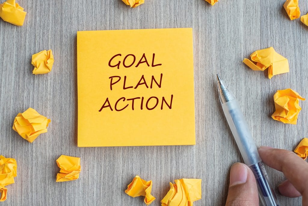 Post-it note: Goal, Plan, Action
